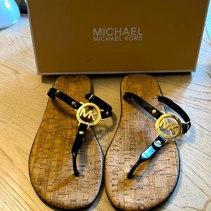 Michael KORS gentle worn sandals with love black with MK emblem size 10